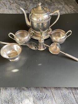 1883 Brogers Silver, Silver Plate. Small Tea Set Along With 14 Paul Revere Design