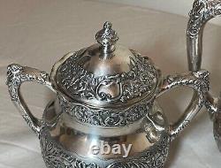 3 pc. Antique ornate Victorian chased Pairpoint silverplate coffee tea pot set