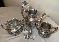 3 pc. Antique ornate Victorian chased Pairpoint silverplate coffee tea pot set