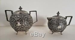 An Indian Colonial silver five piece tea set and tray, Kutch India c. 1900