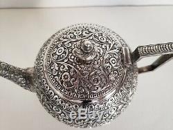 An Indian Colonial silver five piece tea set and tray, Kutch India c. 1900