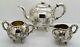 Chinese Export Solid Silver Tea Set. Applied Plum Blossom Branch. Luen Hing 1890