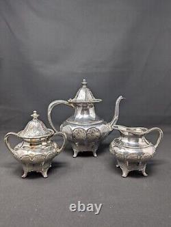 LOVELY CINQUEFOIL! 4pc Repousse Tea Set EUREKA Silverplate FLORAL Etching Teapot