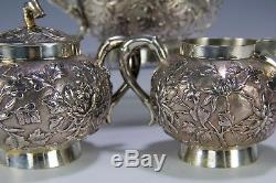 Nice Three Piece Chinese Export Silver Tea Set With Relief Flowers