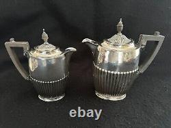 Silverplate tea set teapot coffee servers tray Art Nouveau Kirby Beard ca. 1900