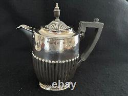 Silverplate tea set teapot coffee servers tray Art Nouveau Kirby Beard ca. 1900