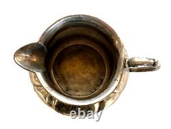 Service à thé en argent plaqué Quad Plate de la compagnie Victorian Britannia Metal Co., martelé à la main et ciselé