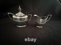 Service à thé en métal argenté, théière, cafetière, plateau Art Nouveau Kirby Beard ca. 1900