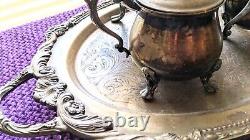 Service à thé vintage en quatre pièces avec pieds en forme de dauphin en argent plaqué Sheridan