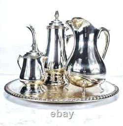 Service complet de café et thé en argent de William Adam, style vintage, comprenant un plateau, une théière, une crémalière et un pichet.